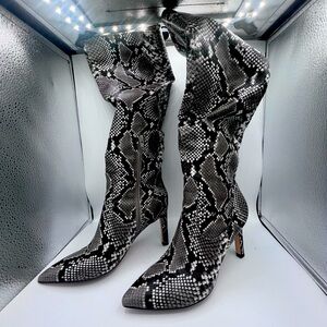 Knee high snake boots